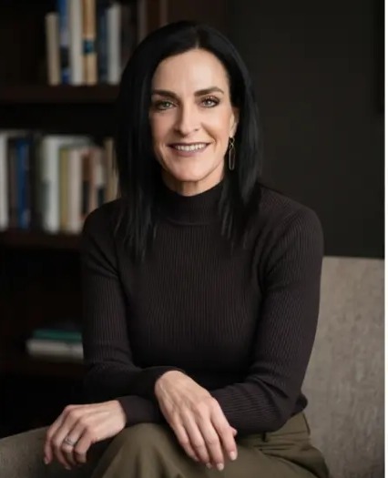 Karen Ice, LMFT, seated in her office